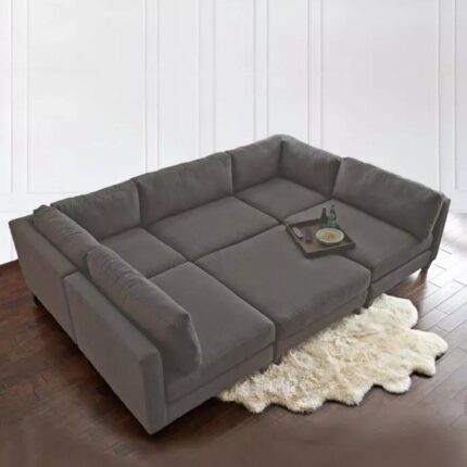 Kivona Versatile Sectional Sofa with Ottoman